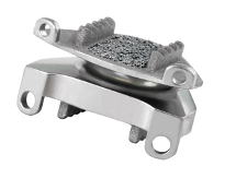 A two-level artificial disc replacement is shown outside of a body. It is two thick sheets of steel with serrated teeth at the top and bottom. There are holes in the foreground where the device is meant to be attached to bones.